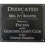 A plaque that says dedicated to mrs. Ivy bogstie