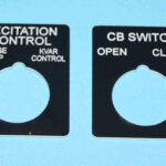 A close up of two different labels for an electrical device