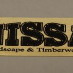 A sticker that says nissa landscape and timberworks.