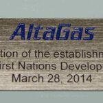 A plaque that says altagas, the institution of the establishment.