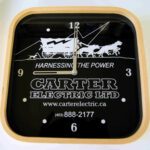 A clock with the words " carter electric ltd ".