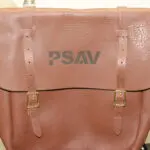 A brown bag with the letters psav written on it.