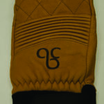A close up of the front of an oven mitt