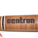 A wooden baseball bat with the word " centron " written in it.