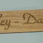 Picture of Harley Davidson signs on wood