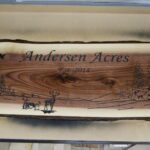 Andersen Acres wrote on wood image